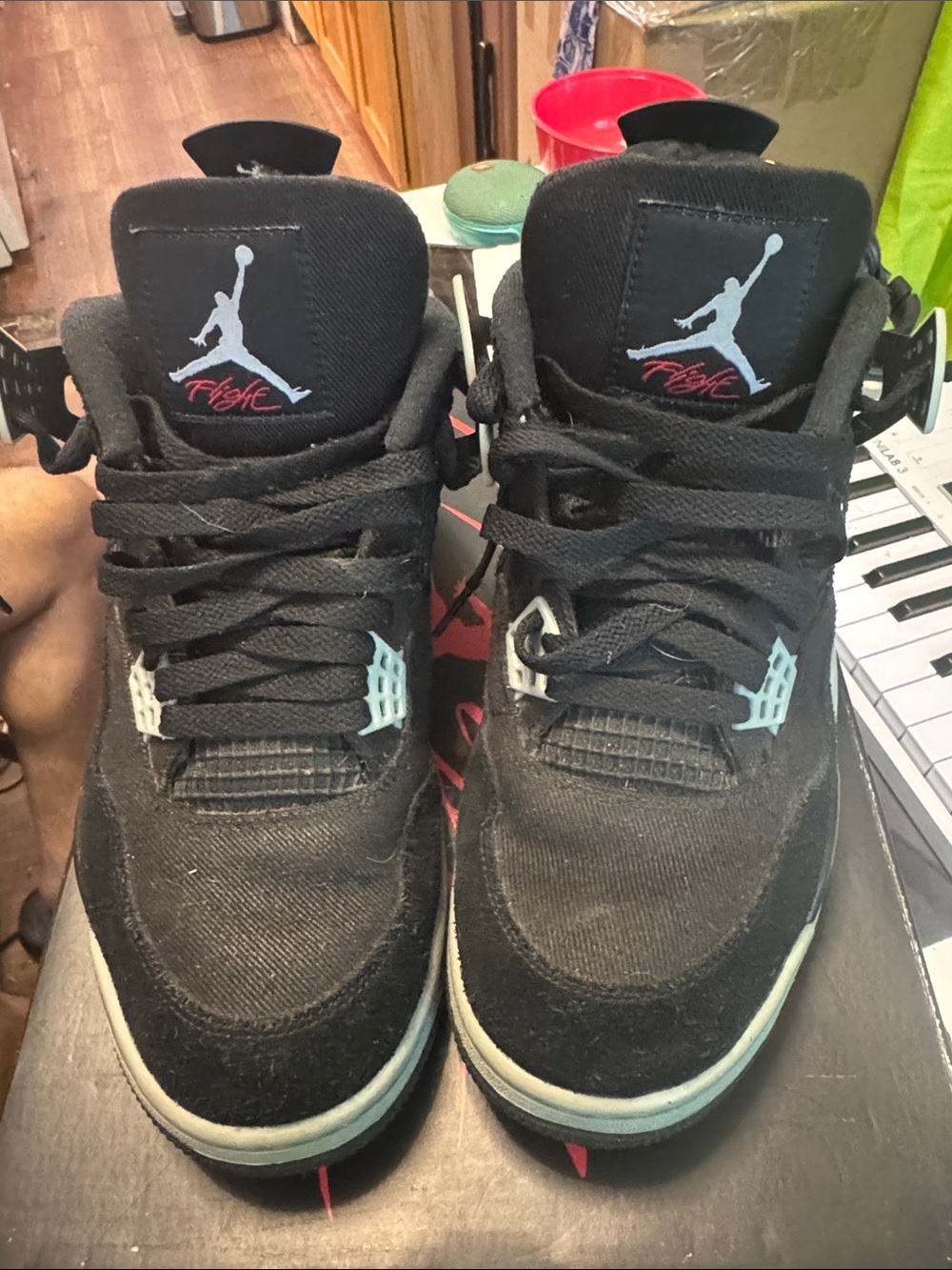 Men’s Jordan Sneakers in Black with Light Blue Accents